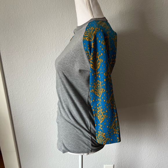 Lularoe Randy Raglan Gray with Blue & Mustard Yellow Patterned Sleeves - Picture 2 of 4